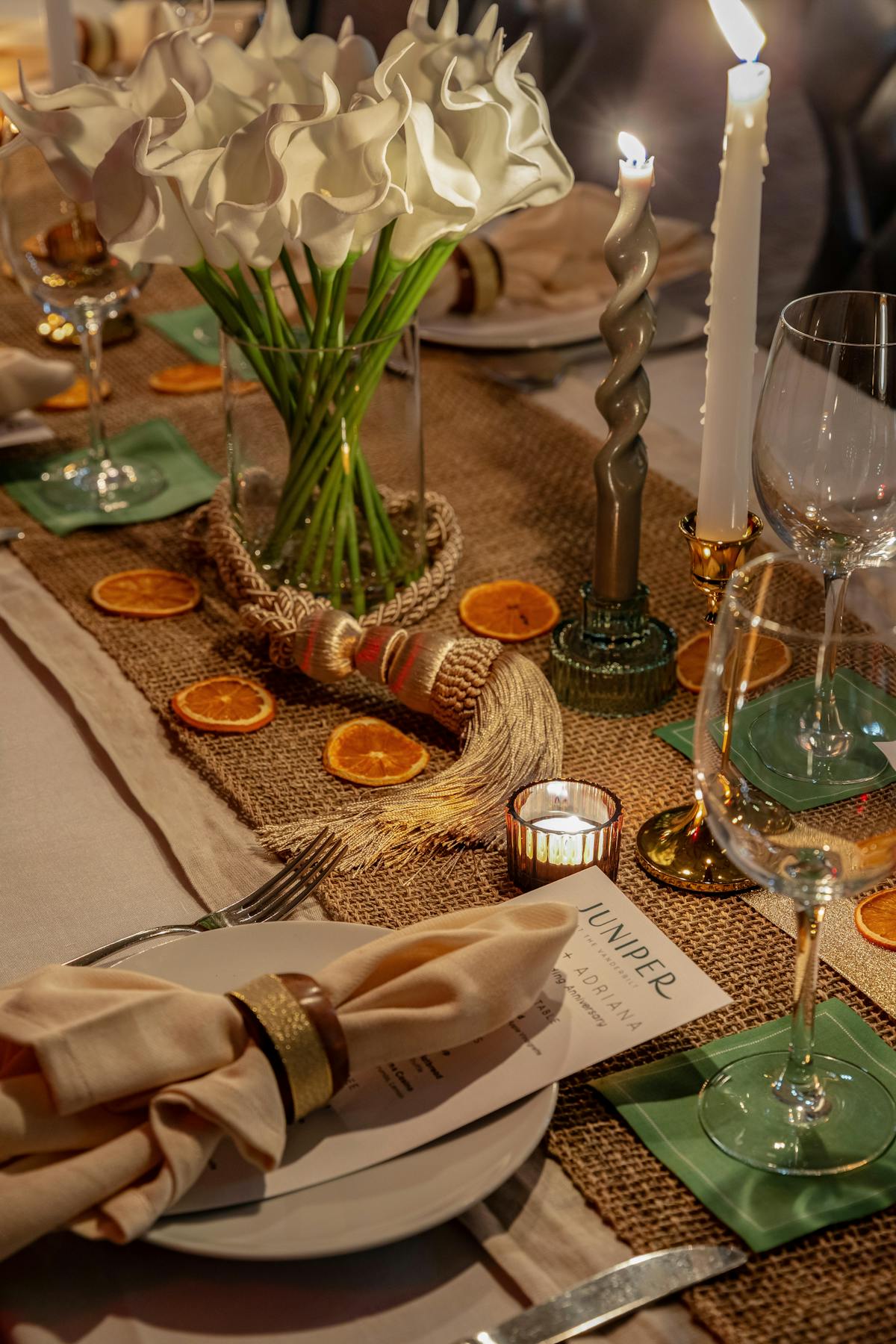 a table topped with glasses of wine