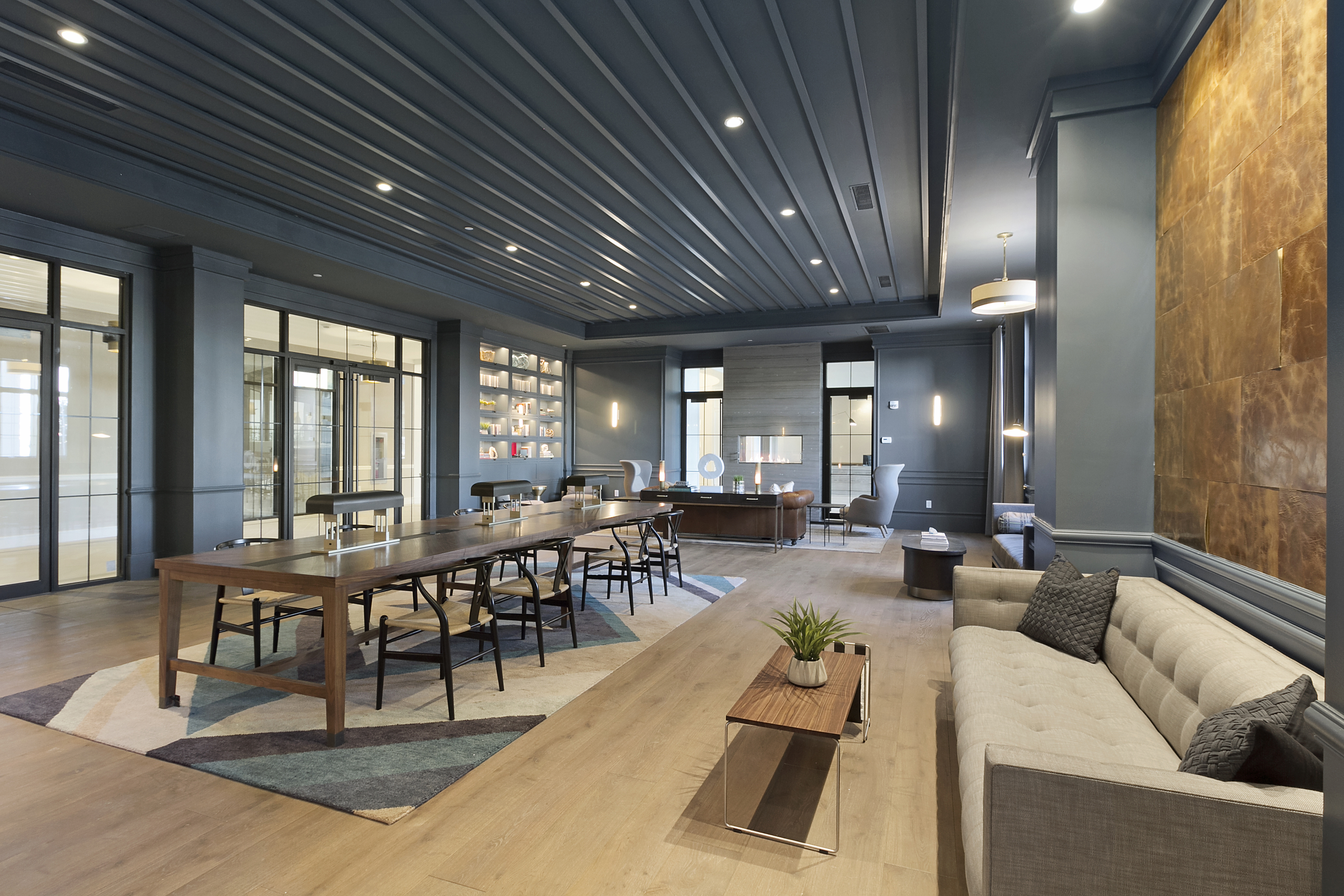 a room filled with furniture and a large window