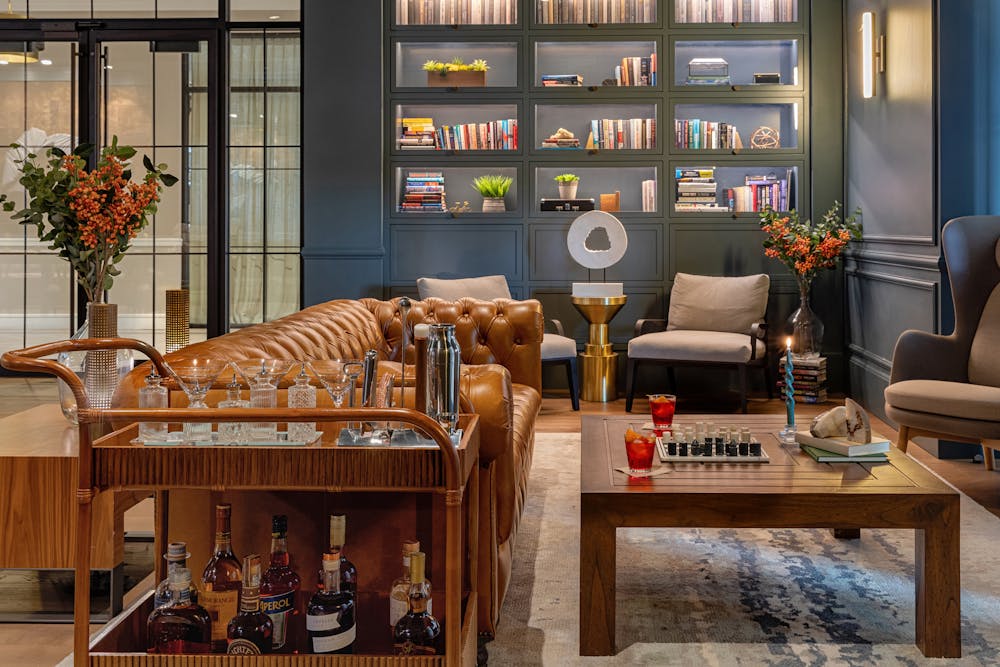 a living room filled with furniture and a fireplace