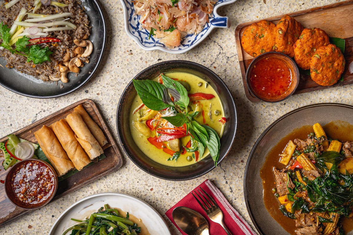 a bowl filled with different types of food on a table