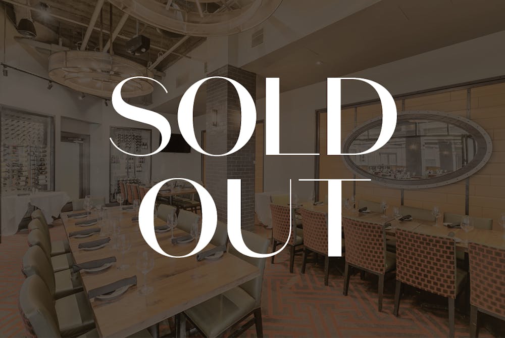 a kitchen with a table in a room