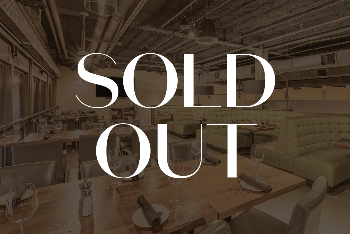 a kitchen with a table in a room