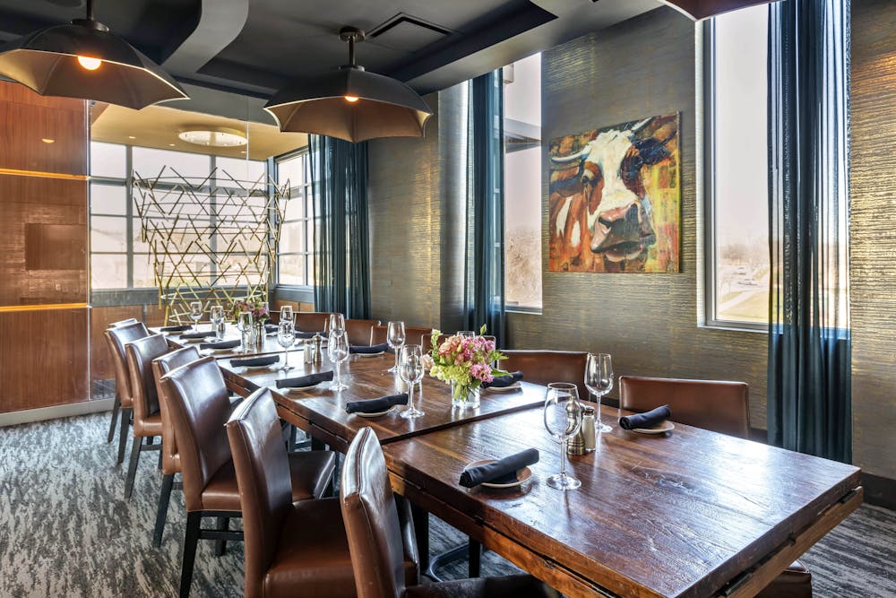 an office with a desk and chair in a room