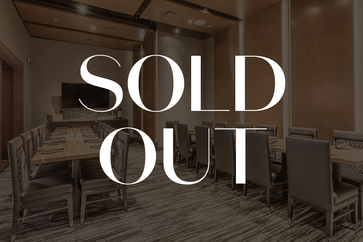 a kitchen with a table in a room