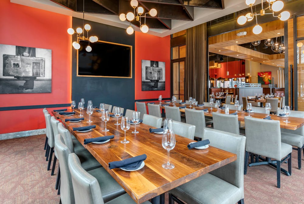 a kitchen with a table in a room