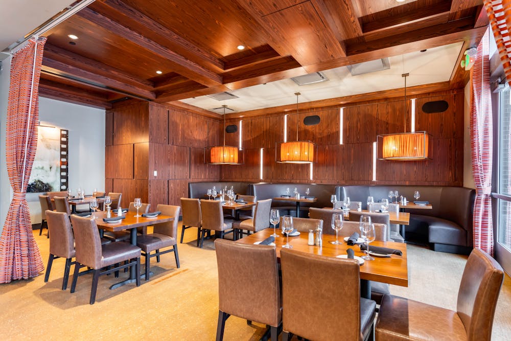 a dining room table in front of a building