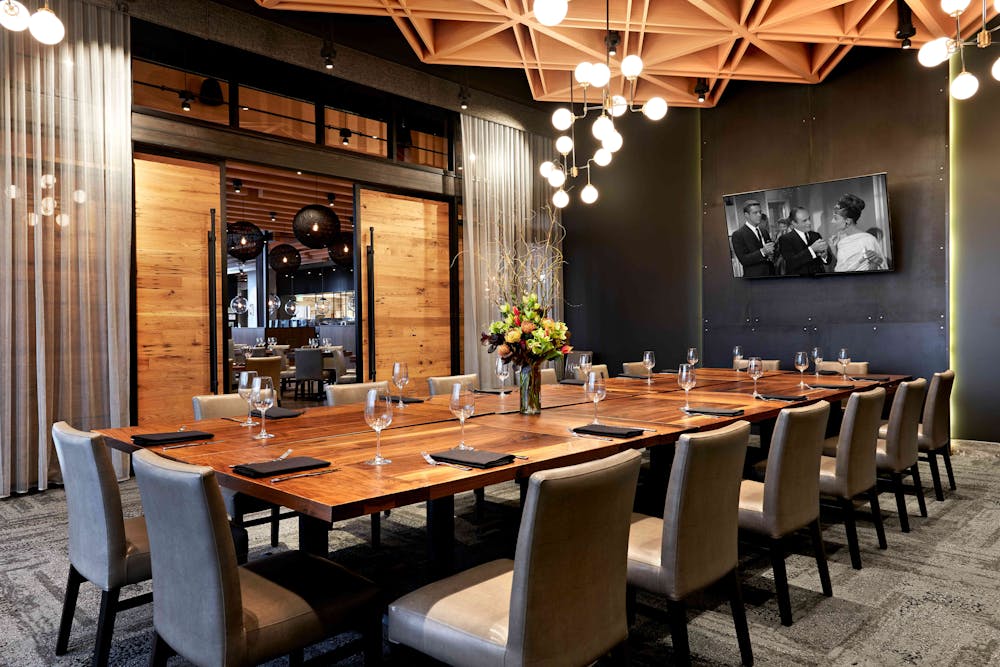 a kitchen with a table in a room