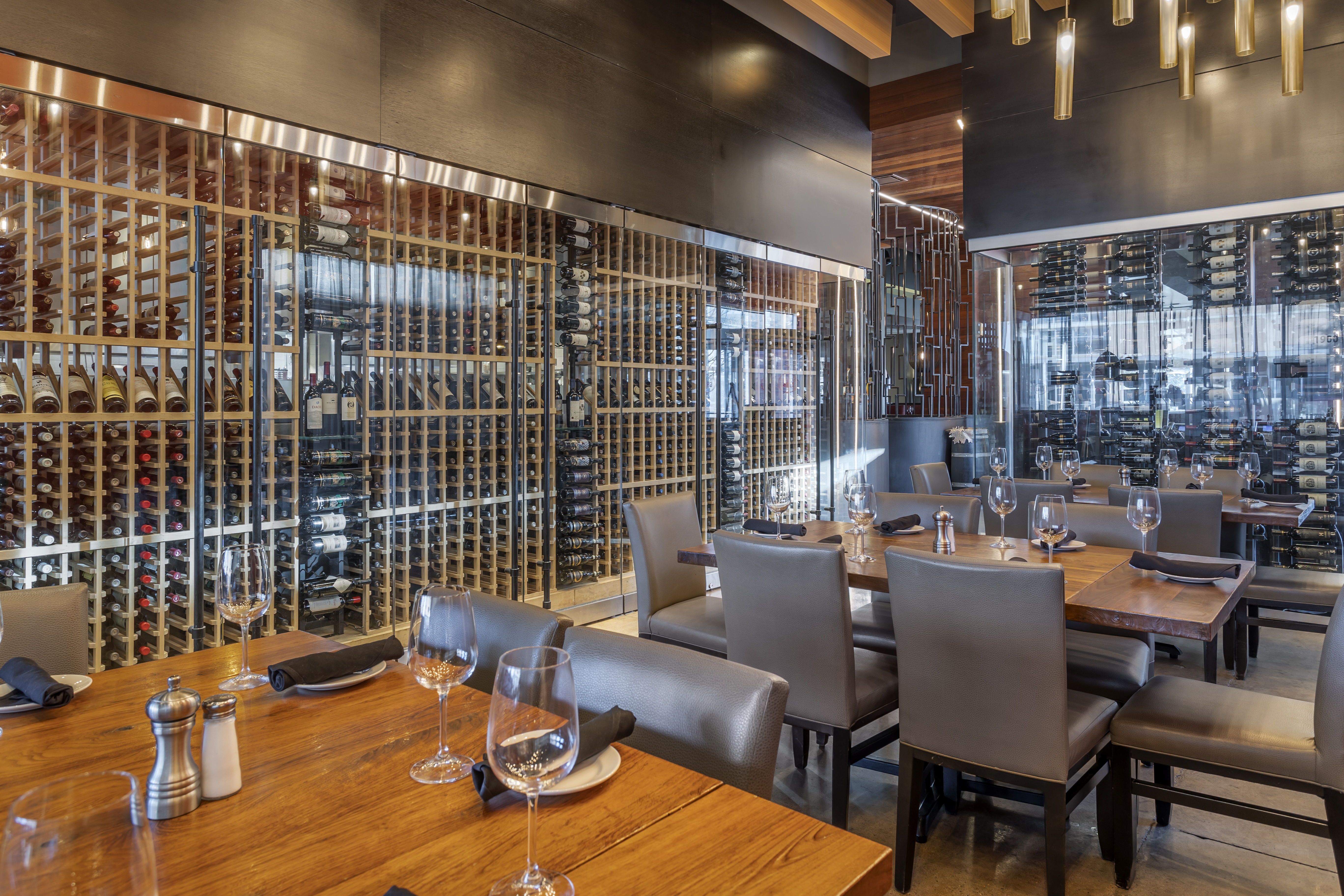 a dining room table in front of a window