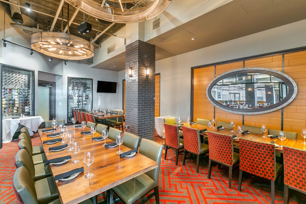 a kitchen with a table in a room