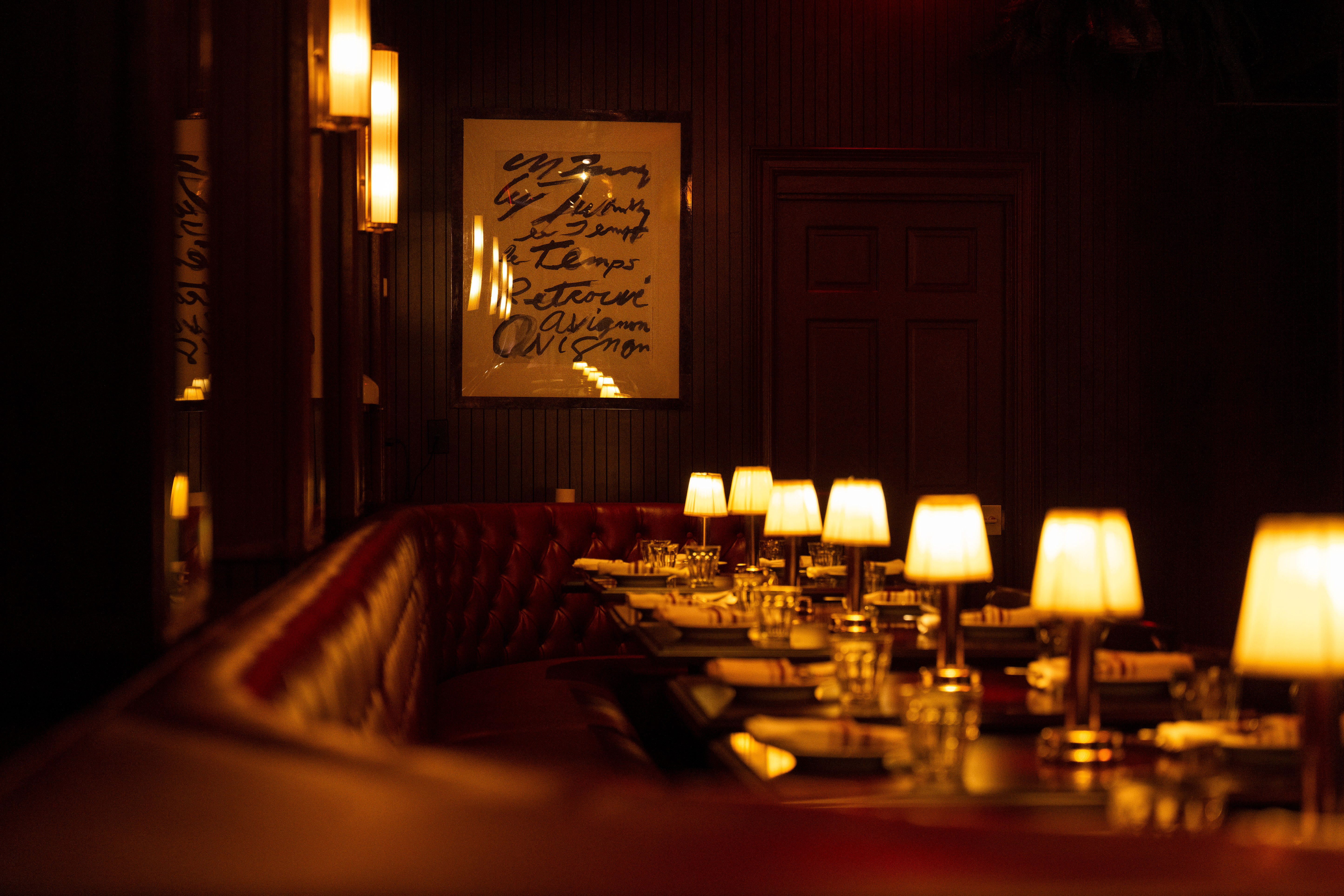 a table with plates and lamps on it