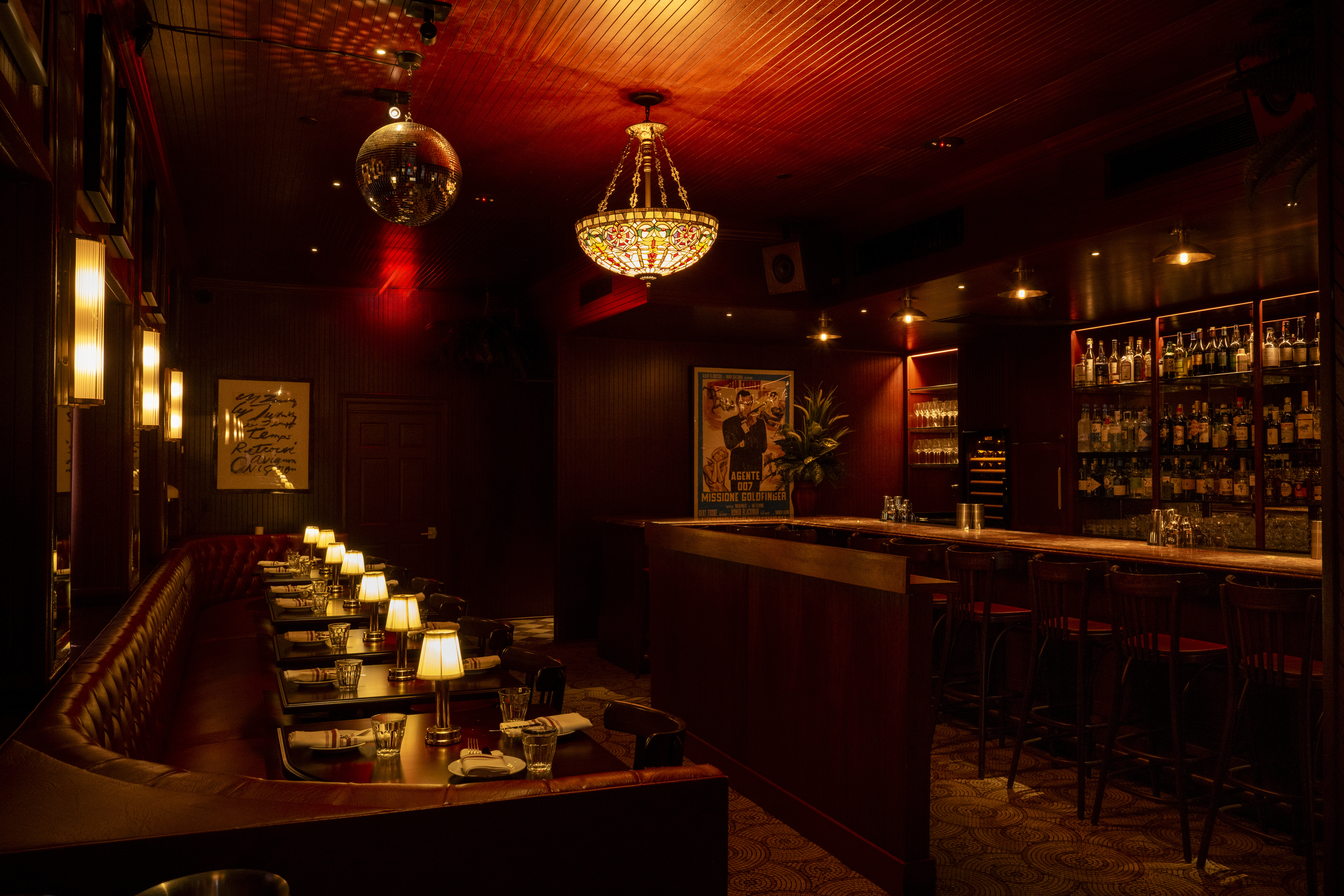 a room with tables and chairs and lights
