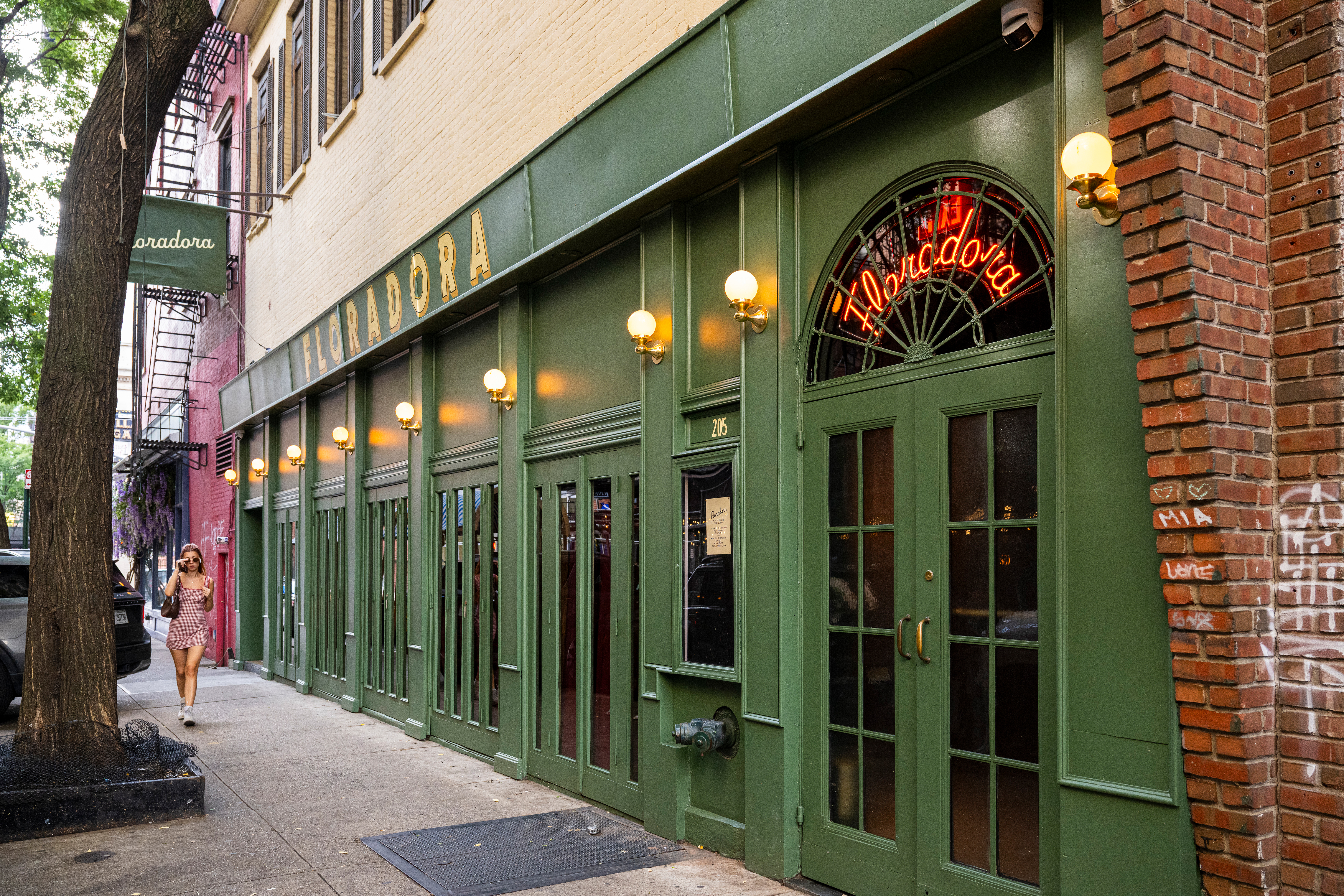 a building with green doors and windows