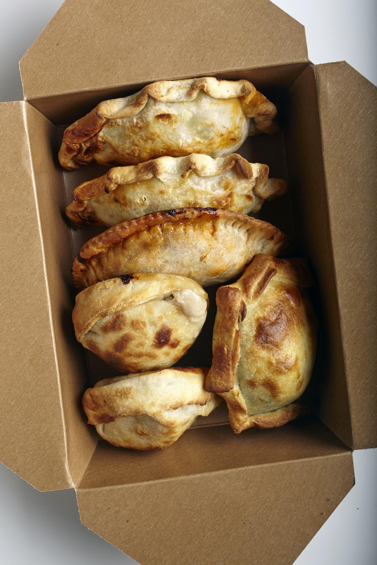a box filled with different types of bread