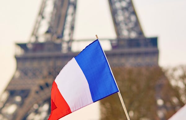 a flag with a blue umbrella