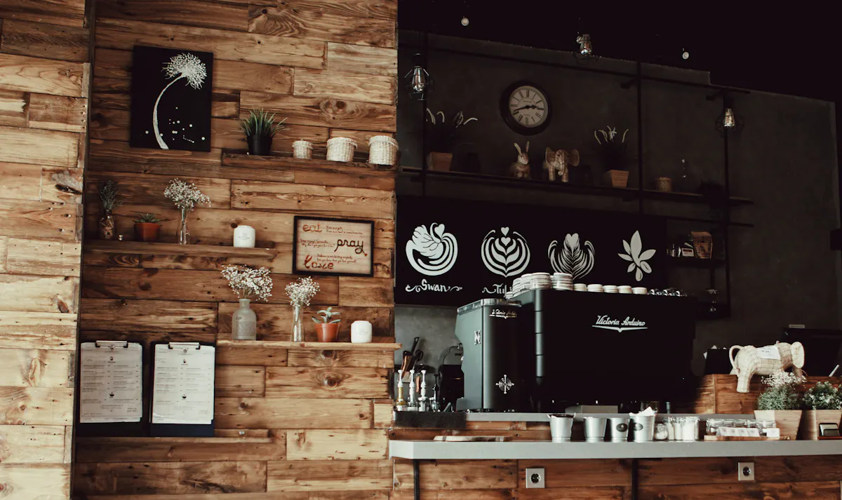 a kitchen with wooden cabinets and a fireplace