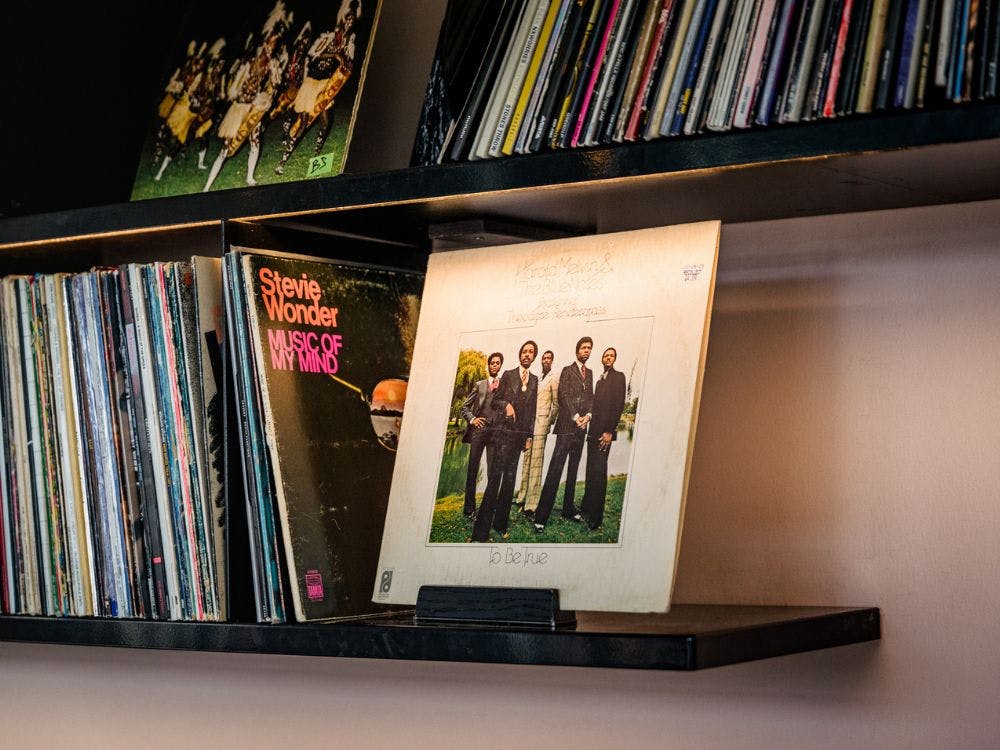 a group of vinyl cds