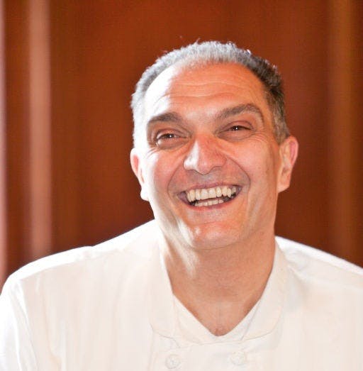 a man smiling for the camera