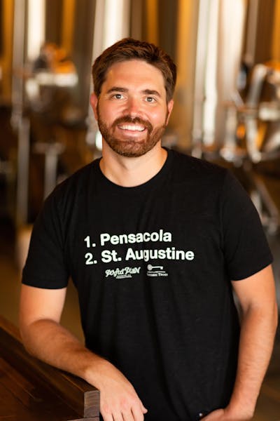 a man smiling for the camera