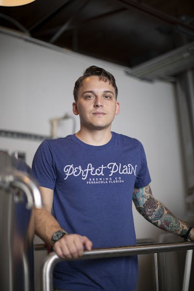 a man in a blue shirt