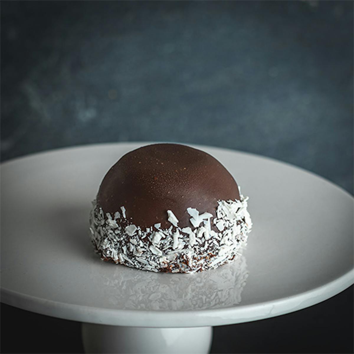 a small doughnut on a plate