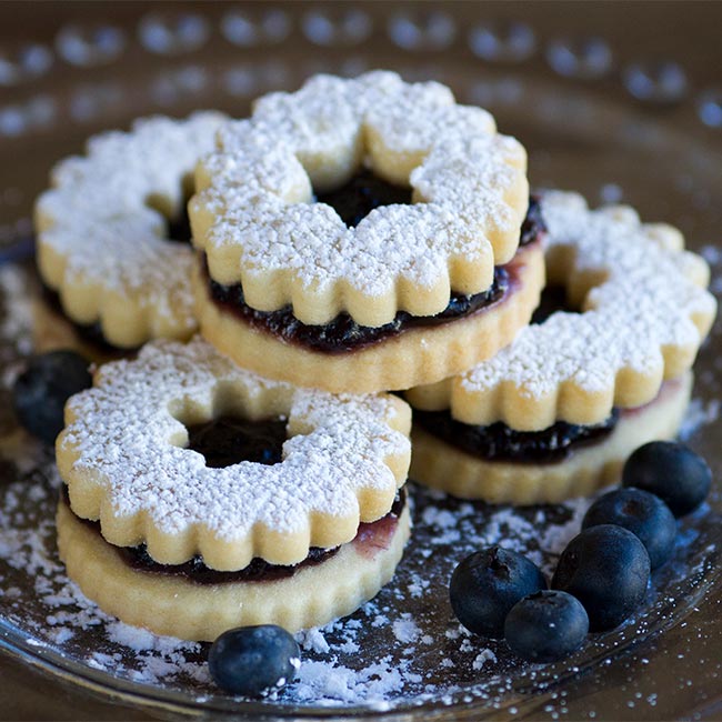 a close up of a doughnut on a plate