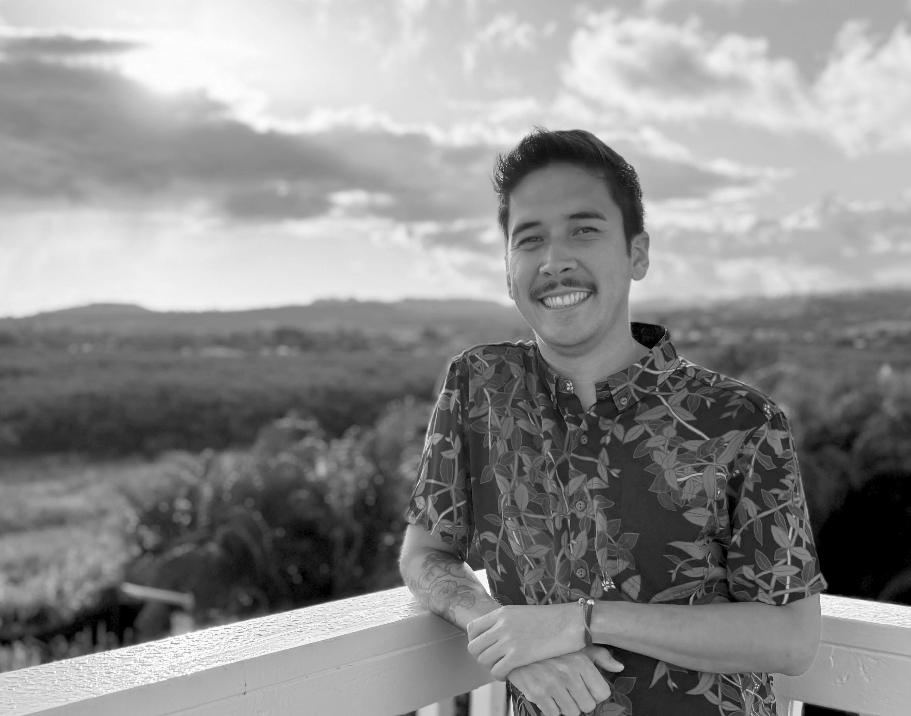 a man smiling at camera