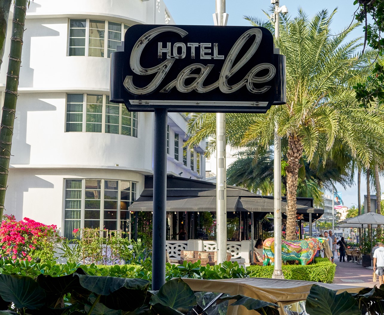 a sign in front of a building