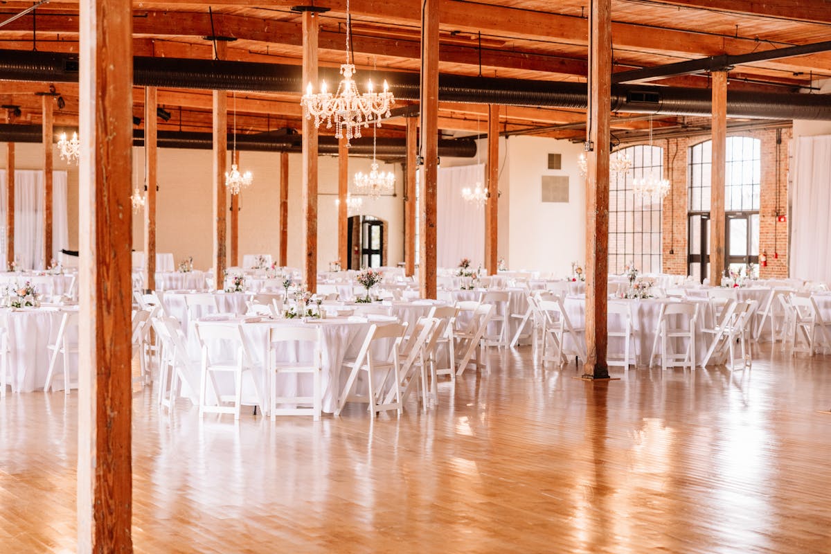 a room filled with furniture and a large window