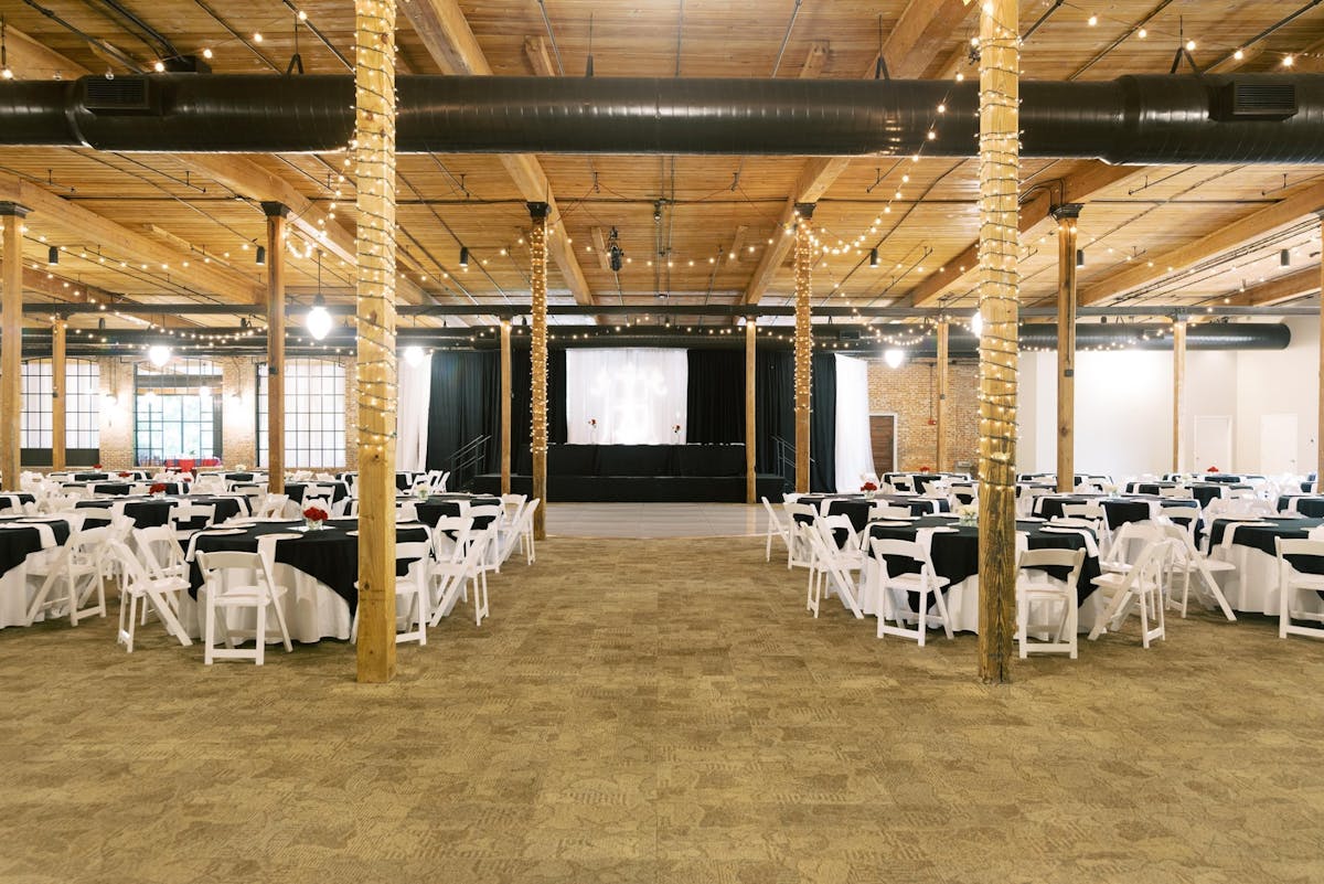 a room with a table and chairs