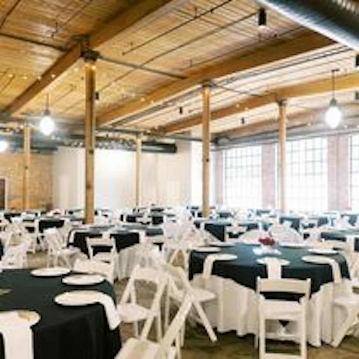 a room with a table and chairs