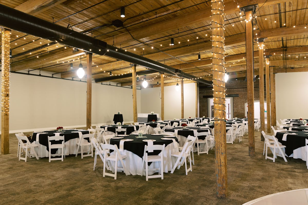 a room with a table and chairs