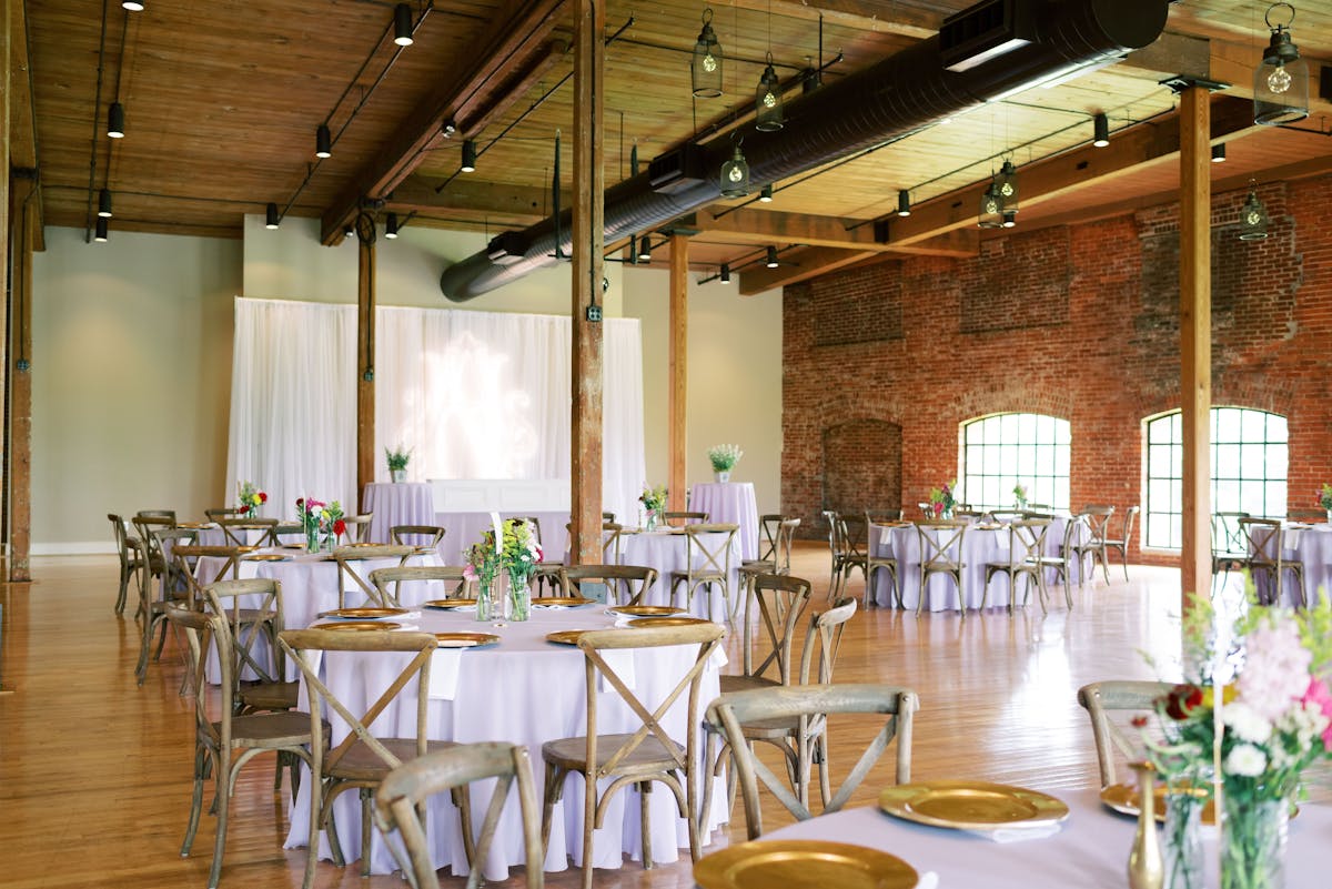 a room with tables and chairs