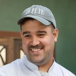 a man standing in front of a camara