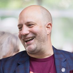 a man standing in front of a camara