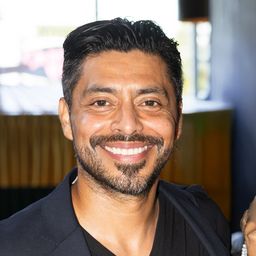 a man standing in front of a camara