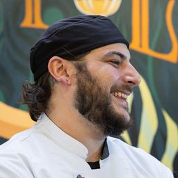 a man standing in front of a camara