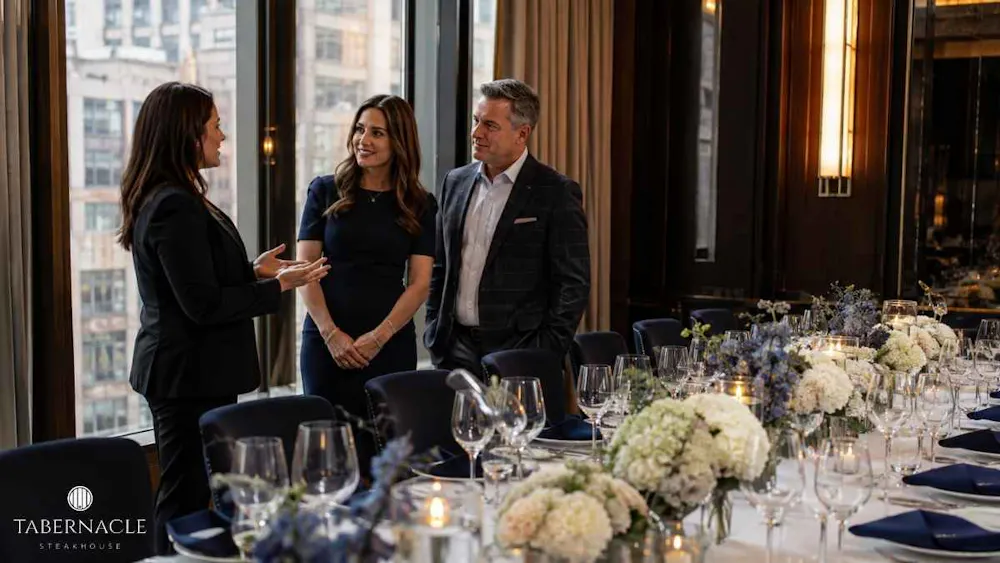 couple-meeting-with-event-coordinator-in-decorated-private-dining-room