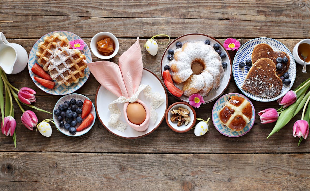 a bunch of food sitting on top of a wooden table
