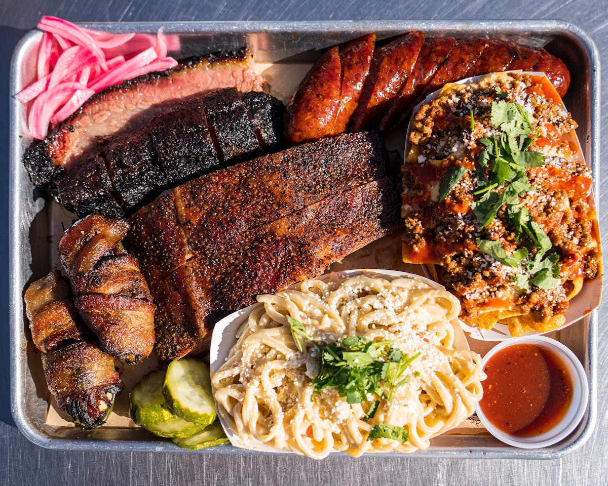 a box filled with different types of food on a tray