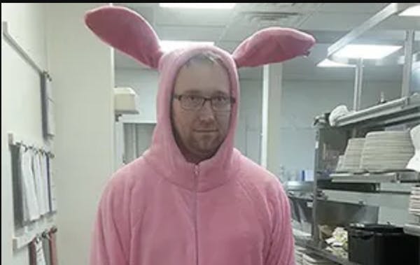 a man standing in a kitchen