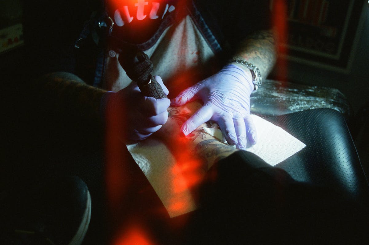 a person sitting in a dark room