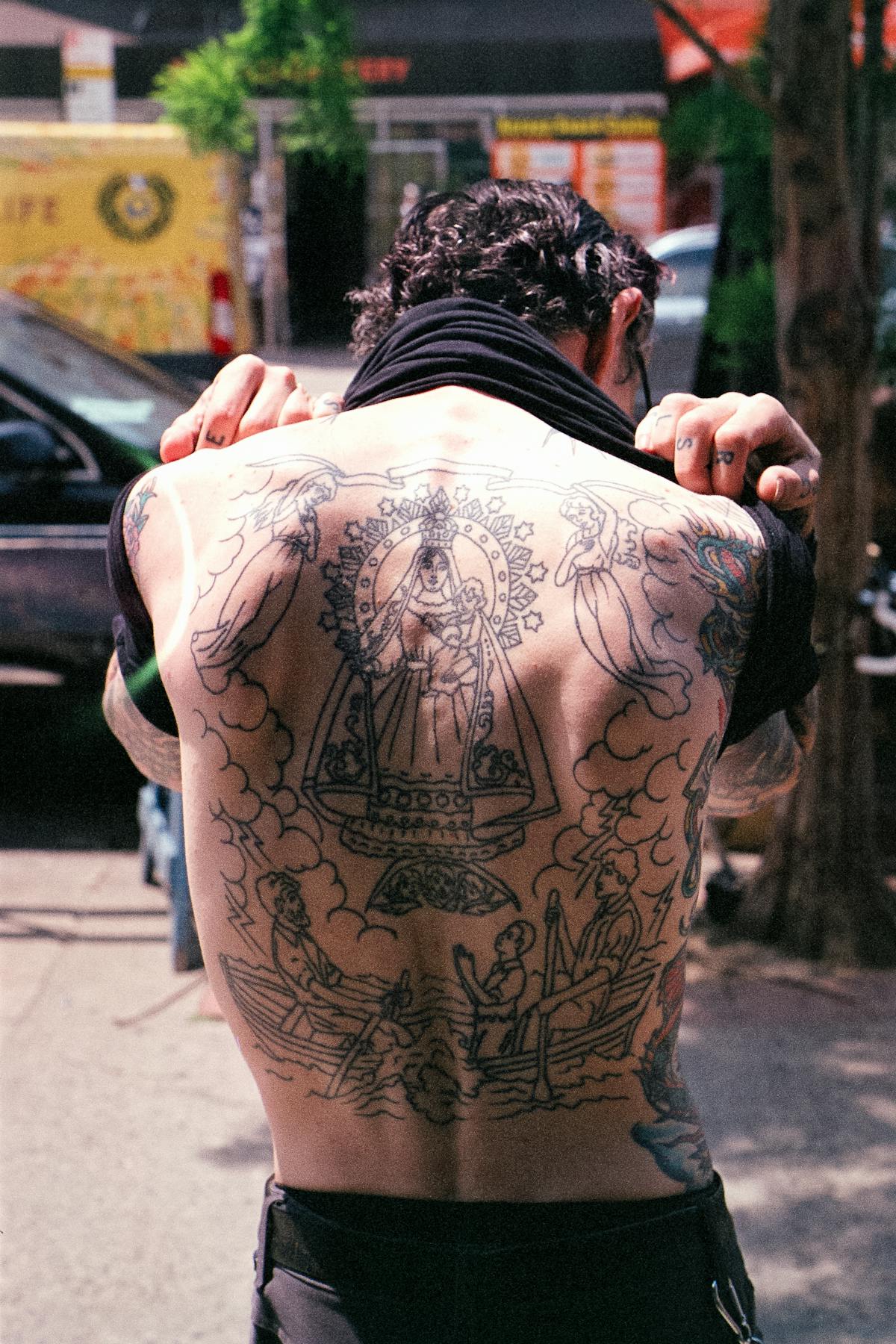 a tattoo on a city street