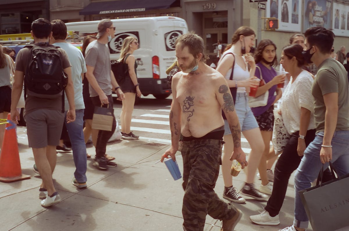 a group of people standing around each other