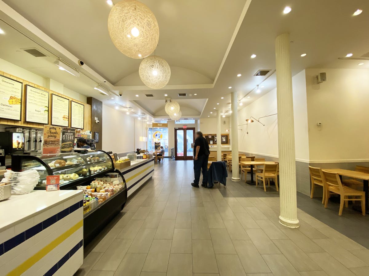 a group of people standing in a room