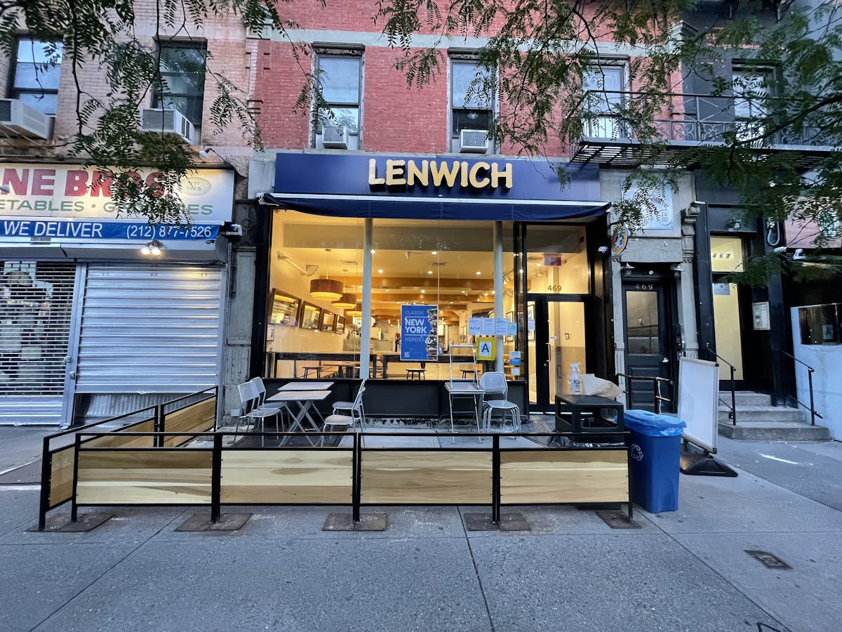 a bench in front of a store