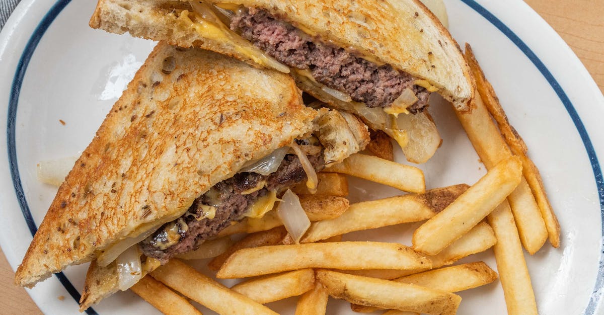 a sandwich and fries on a plate