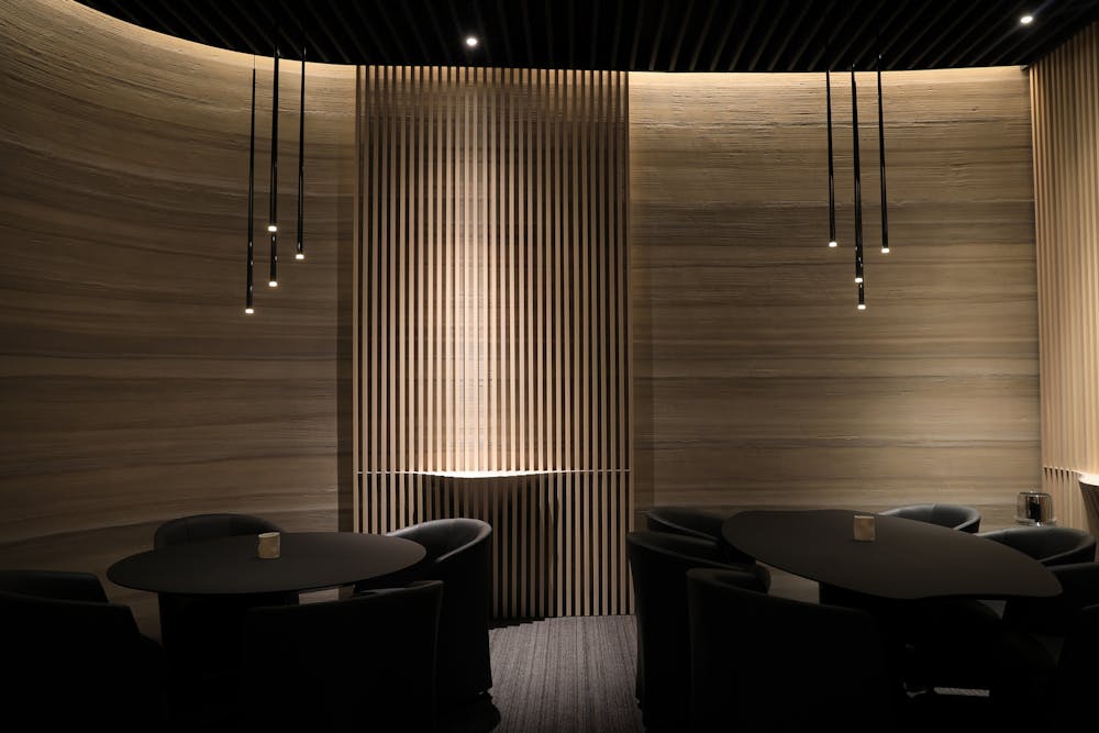 a room filled with furniture and a large window