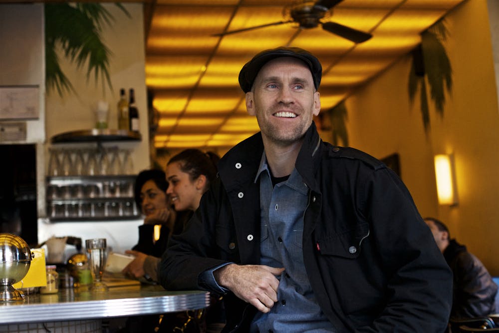 Sean Meenan standing in front of a restaurant