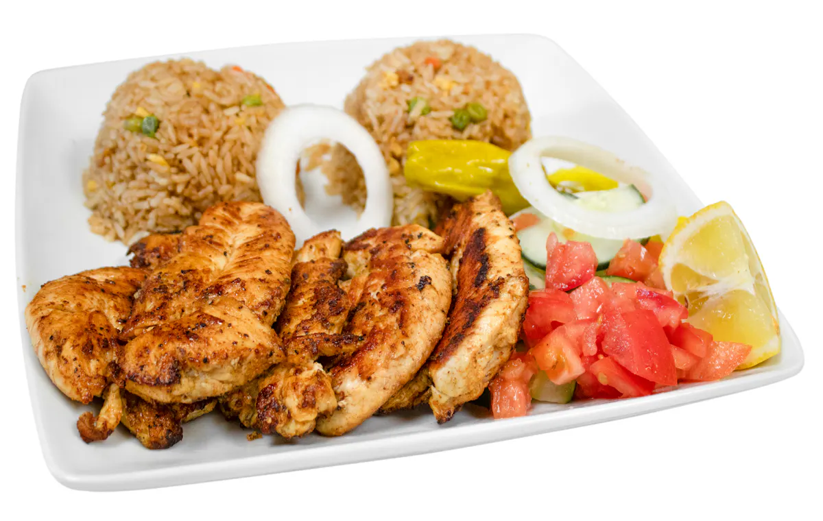 a box filled with different types of food on a plate