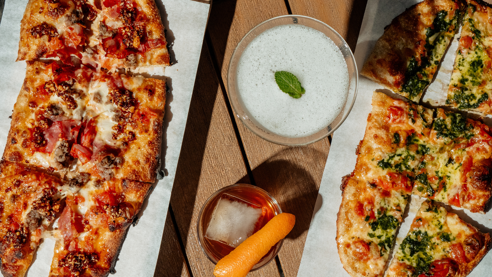 a slice of pizza sitting on top of a table